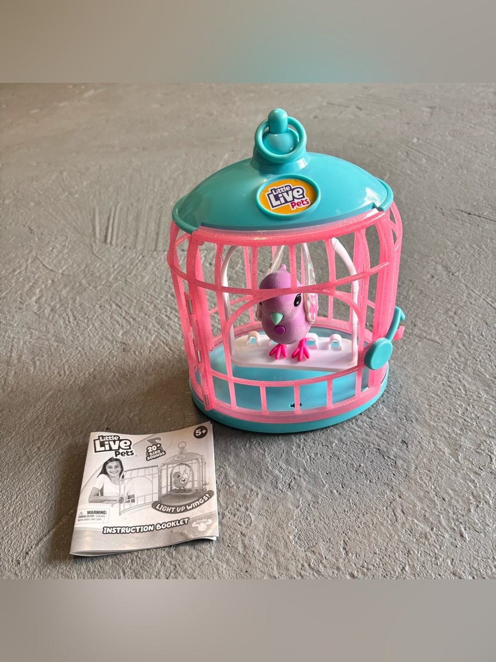 Little Live Pets Polly Pearl Bird & Cage Purple Parakeet With Manual Working